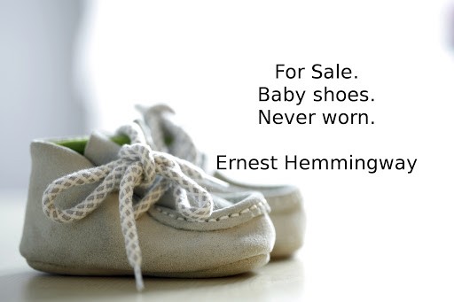 pair of mocassin baby shoes with laces